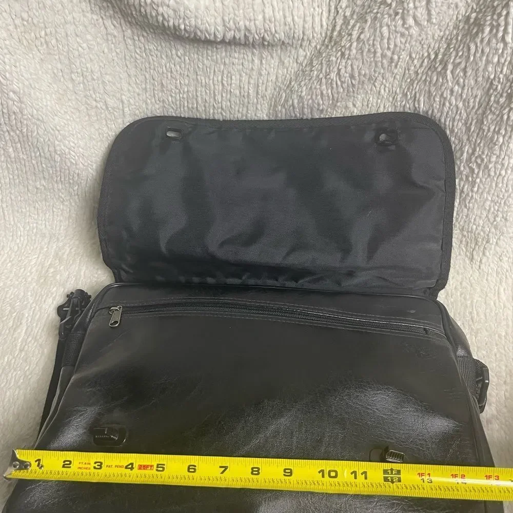 Nike Classic Black Messenger Bag with logo accent.